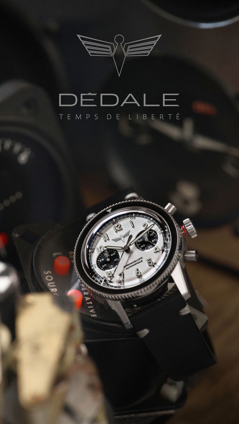 Montre française aéronautique DÉDALE WP-01 PAPA, cadran noir et bracelet en acier inoxydable 316L WingSteel, devant des instruments d'avion. Logo et slogan DÉDALE